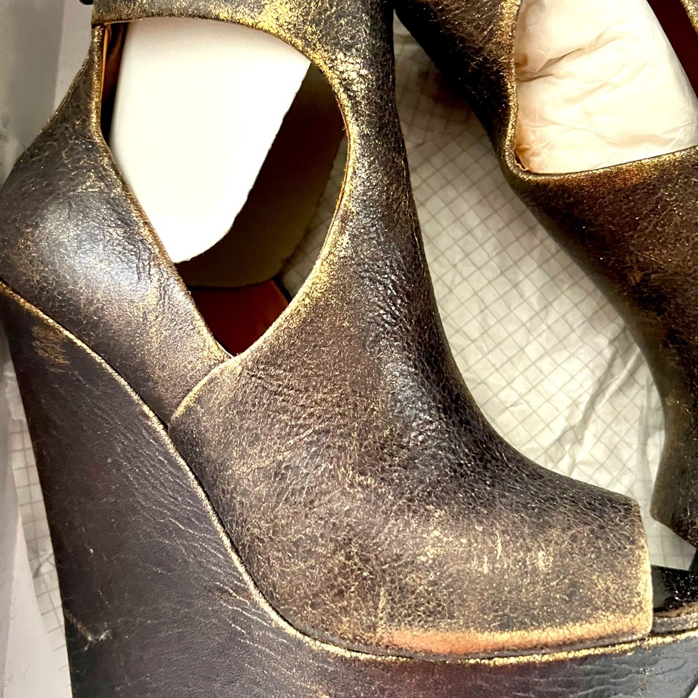 L.A.M.B. Bronze gold platform bootie! Hot find! Sleek and trendy!